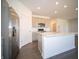 Kitchen with stainless appliances, modern cabinetry, and kitchen island at 9236 Kavanaugh Dr, Indianapolis, IN 46239