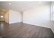 Open-concept living space with wood floors combines the living, and dining areas at 9236 Kavanaugh Dr, Indianapolis, IN 46239