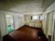 Kitchen features white cabinets and a double sink at 1125 Laurel St, Indianapolis, IN 46203
