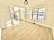 Bright living room with hardwood floors and large windows at 1419 Jeffrey W Ct, Carmel, IN 46032