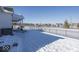 Fenced backyard with a snow-covered lawn and view of neighborhood at 19046 Beverly Shones Ln, Noblesville, IN 46062