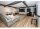 Finished basement with sectional sofa and large TV at 19046 Beverly Shones Ln, Noblesville, IN 46062