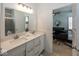 Double vanity bathroom with a large mirror and a walk-in shower at 19046 Beverly Shones Ln, Noblesville, IN 46062