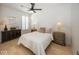 Bright bedroom with a queen-size bed and light wood floors at 19046 Beverly Shones Ln, Noblesville, IN 46062