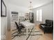 Home office with built-in shelving and a comfortable sitting area at 19046 Beverly Shones Ln, Noblesville, IN 46062