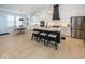 Modern kitchen with white cabinets, marble countertops, and a large island at 19046 Beverly Shones Ln, Noblesville, IN 46062