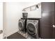 Laundry room with washer, dryer, and ample storage at 19046 Beverly Shones Ln, Noblesville, IN 46062