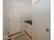 Convenient laundry room with built-in cabinets at 19046 Beverly Shones Ln, Noblesville, IN 46062