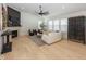 Spacious living room with a large sectional sofa and a cozy fireplace at 19046 Beverly Shones Ln, Noblesville, IN 46062