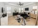 Main bedroom with large bed, ceiling fan, and window shutters at 19046 Beverly Shones Ln, Noblesville, IN 46062