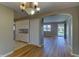 Bright dining area showcasing built-in cabinets and hardwood floors, perfect for entertaining guests at 2010 N Irwin St, Indianapolis, IN 46219