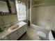 Full bathroom with bathtub, toilet, and vanity at 2607 E 12Th St, Indianapolis, IN 46201
