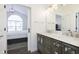 Double vanity bathroom with marble countertop at 2811 Grandview Ln, Greenwood, IN 46143