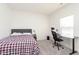 Bright bedroom with a comfortable bed, workspace, and closet at 2811 Grandview Ln, Greenwood, IN 46143