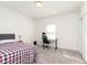 Bright bedroom with a comfortable bed, workspace, and closet at 2811 Grandview Ln, Greenwood, IN 46143