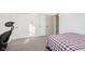 Bedroom with a bed, closet, and built-in workspace at 2811 Grandview Ln, Greenwood, IN 46143
