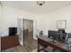 Bright home office features built-in desk and French doors at 2811 Grandview Ln, Greenwood, IN 46143