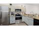 Modern kitchen with stainless steel appliances and granite countertops at 2811 Grandview Ln, Greenwood, IN 46143