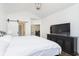 Main bedroom with king bed, TV, and views at 2811 Grandview Ln, Greenwood, IN 46143