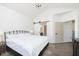 King bedroom with ensuite access and barn door at 2811 Grandview Ln, Greenwood, IN 46143