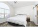 Main bedroom with king bed and barn door to ensuite at 2811 Grandview Ln, Greenwood, IN 46143