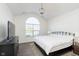 Spacious main bedroom with large window and king bed at 2811 Grandview Ln, Greenwood, IN 46143