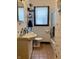 Bathroom with dalmatian print walls, and a shower/tub combo at 2920 Newhart St, Indianapolis, IN 46217