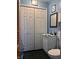 Clean bathroom with white vanity, toilet and large closet at 2920 Newhart St, Indianapolis, IN 46217