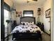 Bedroom with a cow print comforter and dark-wood headboard at 2920 Newhart St, Indianapolis, IN 46217