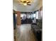 Bedroom with gray couch and dark wood dresser at 2920 Newhart St, Indianapolis, IN 46217