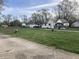 Expansive property featuring a home, garage, RV, and shed on a large, grassy lot at 2920 Newhart St, Indianapolis, IN 46217