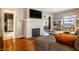 Spacious living room with a fireplace and built-in shelving at 2938 Princeton Pl, Indianapolis, IN 46205