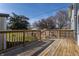 Large wooden back deck for outdoor enjoyment with a clear view of the backyard space at 404 N Gray St, Indianapolis, IN 46201
