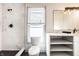Contemporary bathroom featuring marble tile shower and sleek, modern fixtures at 404 N Gray St, Indianapolis, IN 46201