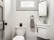 Modern bathroom features a floating vanity, updated fixtures, and stylish design at 404 N Gray St, Indianapolis, IN 46201