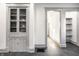 Charming hallway showcasing built-in cabinet and access to adjoining rooms at 404 N Gray St, Indianapolis, IN 46201