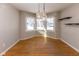 Bright dining area with hardwood floors and bay window at 521 S East St, Plainfield, IN 46168