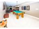 Spacious basement with pool table, comfortable seating, and game area at 5252 Apache Moon, Carmel, IN 46033