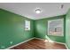 This bedroom has hard wood floors, neutral trim and two windows for light at 7414 Glen Park Way, Indianapolis, IN 46259