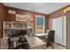 This home office features a spacious work area and built in shelving at 7414 Glen Park Way, Indianapolis, IN 46259
