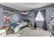 bedroom with a twin bed and plenty of storage at 8023 Xenia Dr, Indianapolis, IN 46227