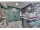 Modern kitchen with dark cabinets and stainless steel appliances at 8023 Xenia Dr, Indianapolis, IN 46227