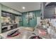 Kitchen features dark cabinets, white backsplash and a breakfast bar at 8023 Xenia Dr, Indianapolis, IN 46227