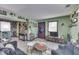 Living room with a view of the kitchen and dining area at 8023 Xenia Dr, Indianapolis, IN 46227