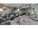Open living space with a view into the kitchen and dining area at 8023 Xenia Dr, Indianapolis, IN 46227