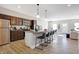Open concept kitchen with island and stainless steel appliances at 1446 E Naomi St, Indianapolis, IN 46203