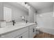Bright, clean bathroom with a double sink vanity, modern fixtures, and ample storage space at 1713 Real St, Indianapolis, IN 46240
