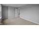 Spacious bedroom with neutral carpeting, light gray walls, and a large closet at 1713 Real St, Indianapolis, IN 46240