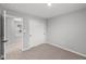 Bedroom featuring neutral paint, carpet, and closet with sliding doors at 1713 Real St, Indianapolis, IN 46240