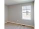 Neutral bedroom with carpet and a large window at 1713 Real St, Indianapolis, IN 46240